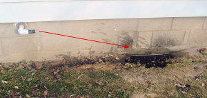 Sump pump discharge hose and drainage example