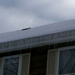 Icicles hanging from a gutter